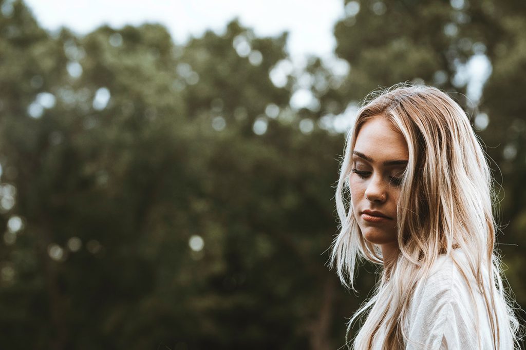 Young woman thinking about abortion